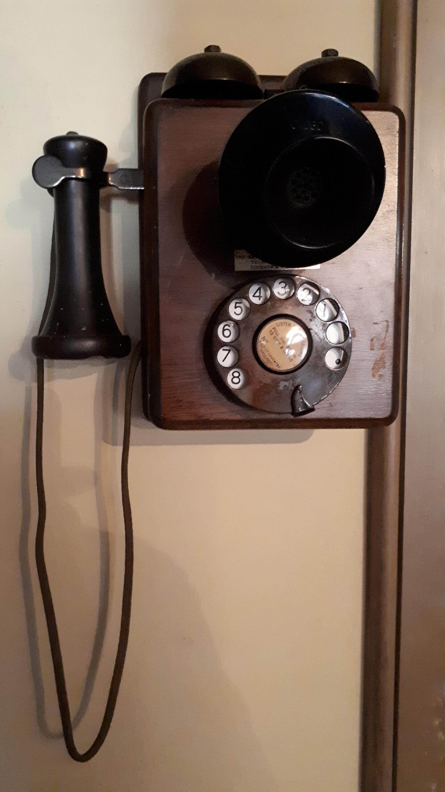 The Wall-Mounted Phone