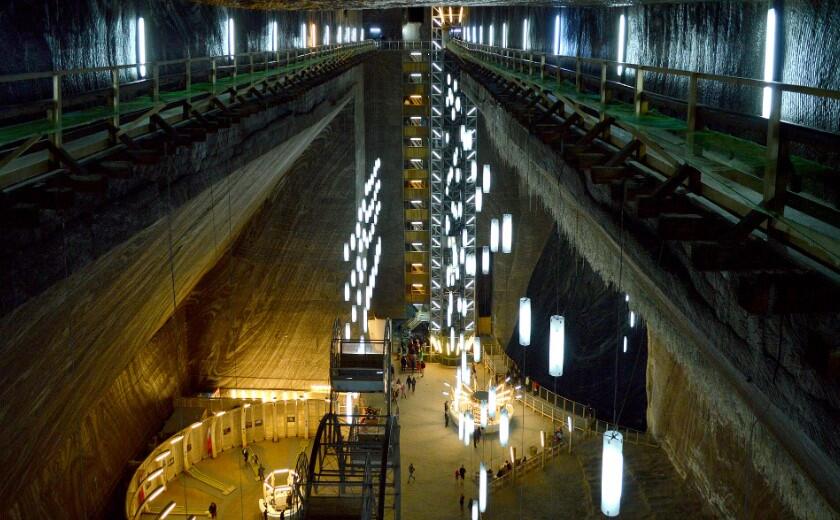 The Romanian salt mine 400 feet underground that became a neon amusement park with a Ferris wheel