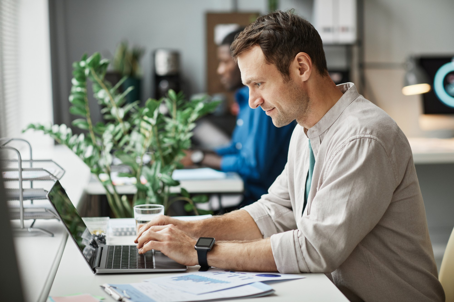 Person working office laptop