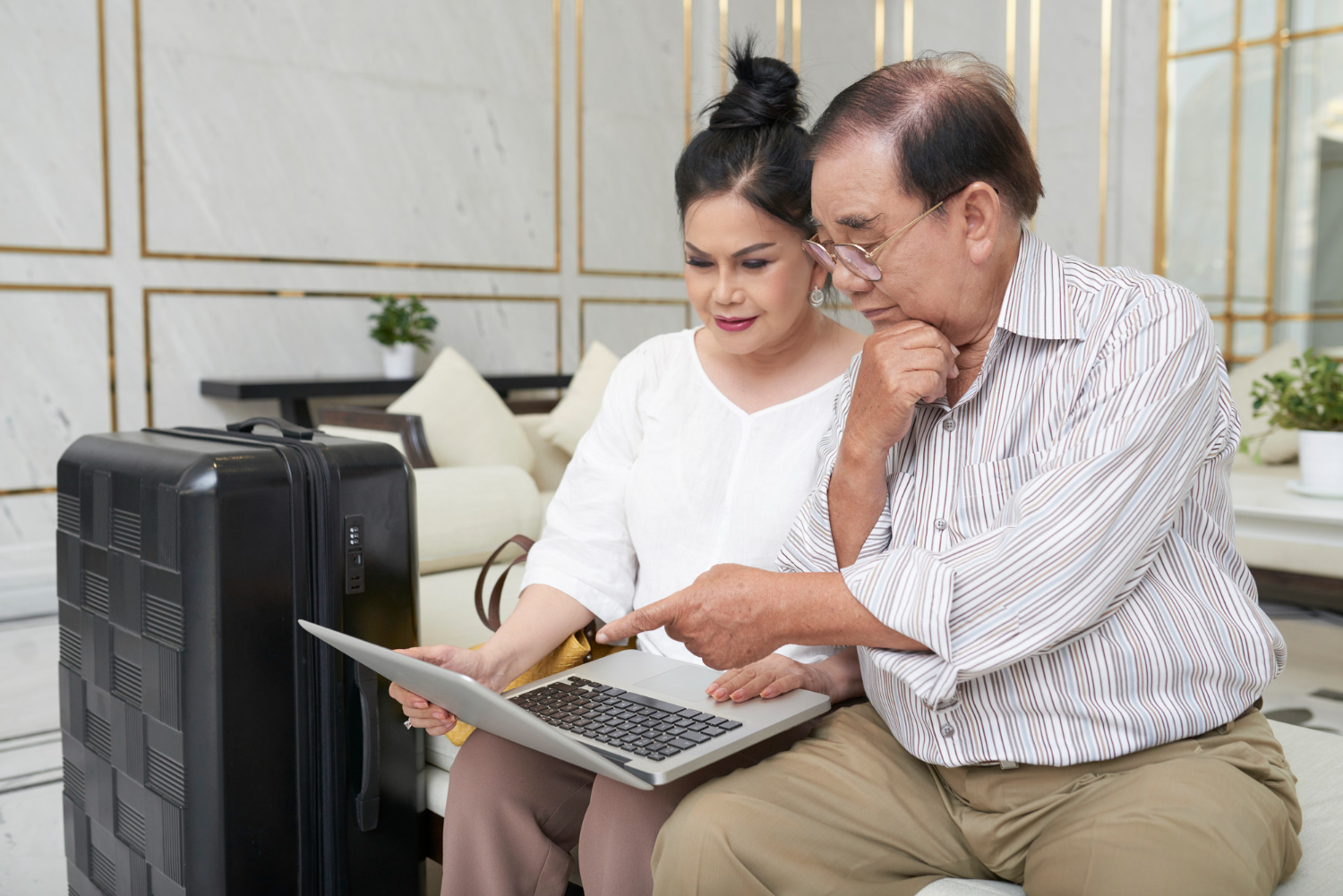 Travelers on laptop