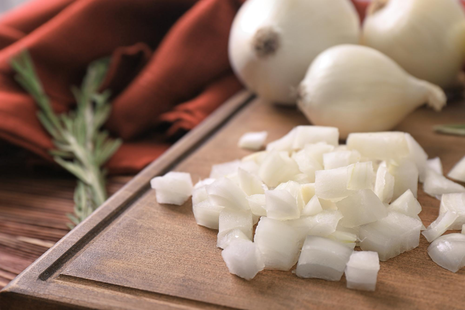 Sliced onion cutting board knife