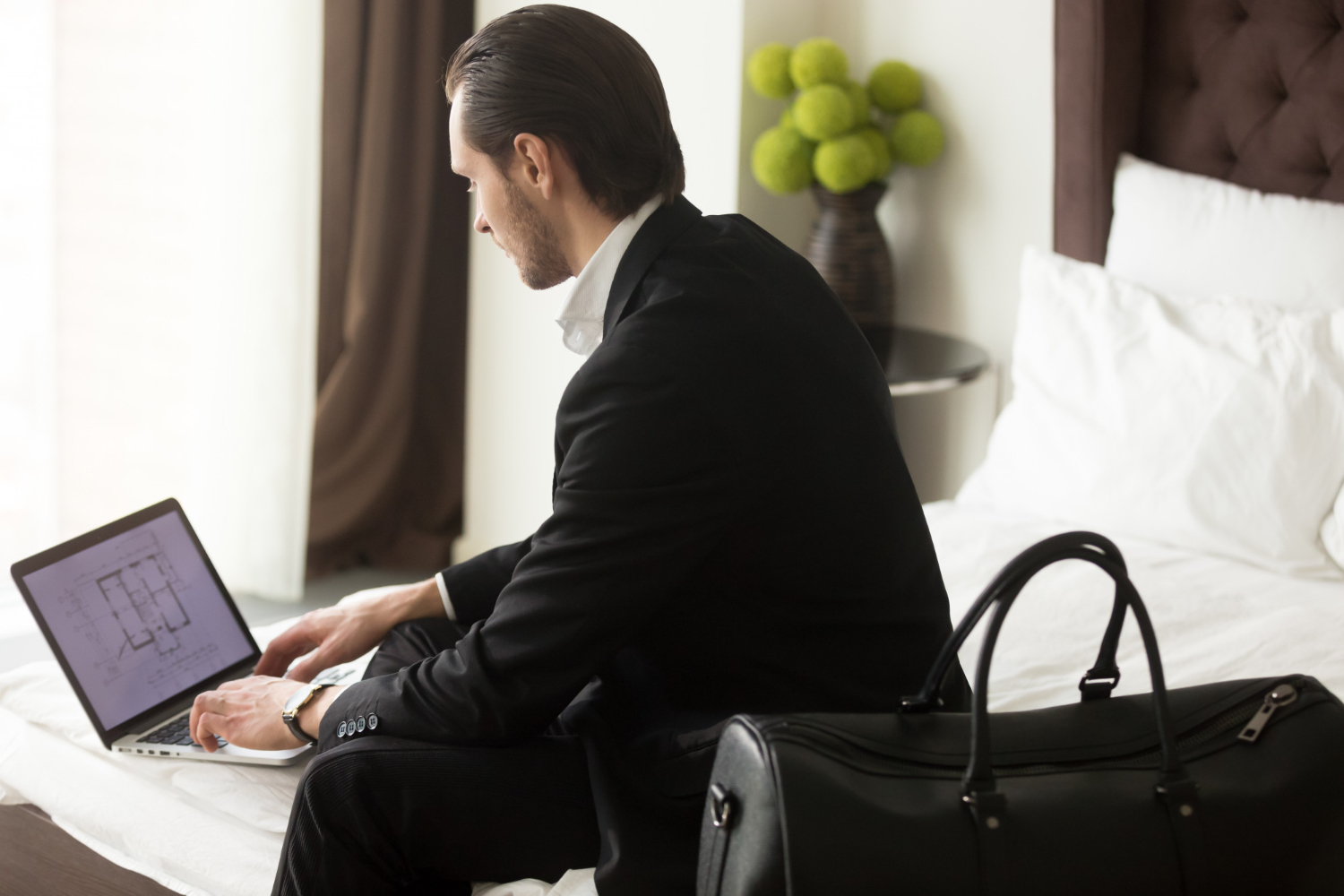 Travelers on laptop