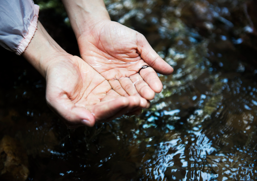 wrinkled fingers water