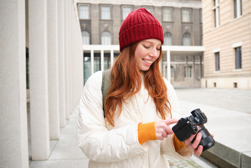 person photographing street