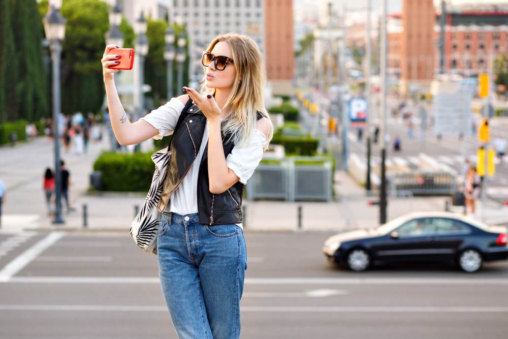 person photographing street