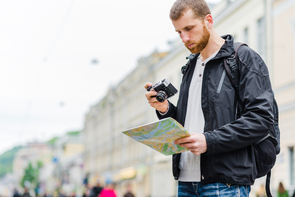 person photographing street