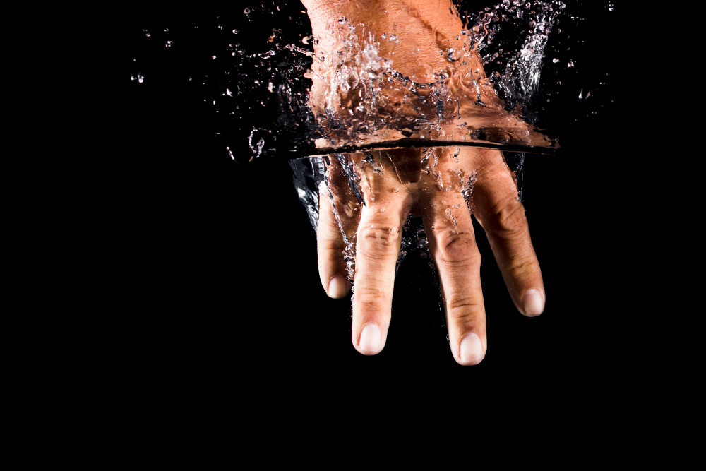 wrinkled fingers water