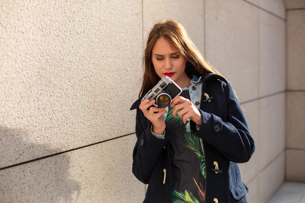 person photographing street