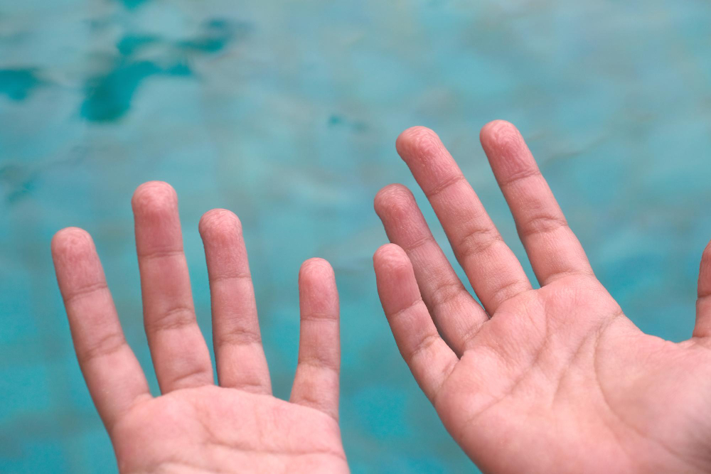 wrinkled fingers water