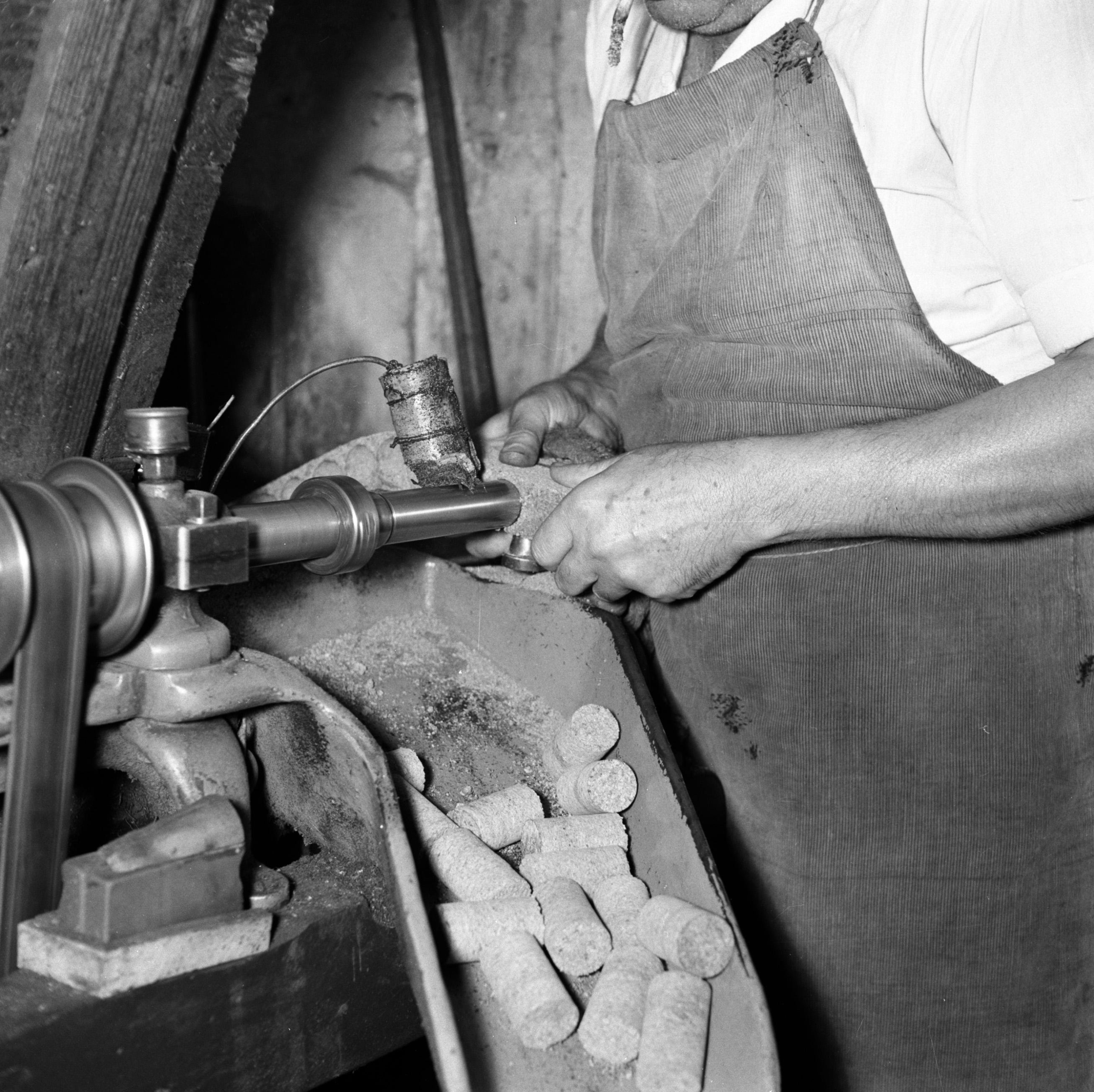 12 Things That Were Normal in a Cork Works in 1960 That Are Still Done by Hand With a Curved Axe